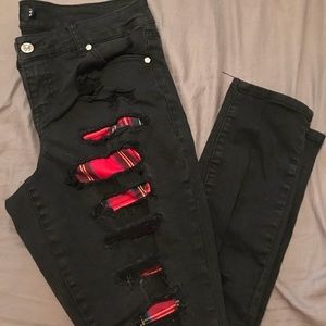 Torrid Ripped Jeans with plaid material in holes